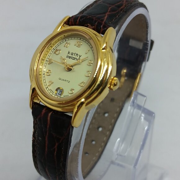 Kathy Ireland 1715 Women's 24mm Gold Tone Quartz Date Watch NEW BATTERY - Picture 1 of 11